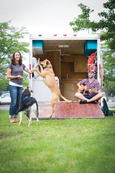 Kelly Tousley, 11, and Curtiss ORorke Stedman with their trailer and dogs